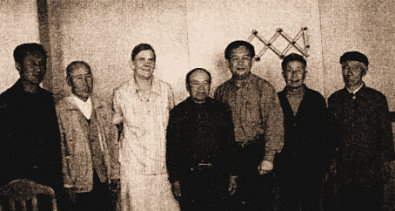 Susan and Kun with the shamans of Wulajie